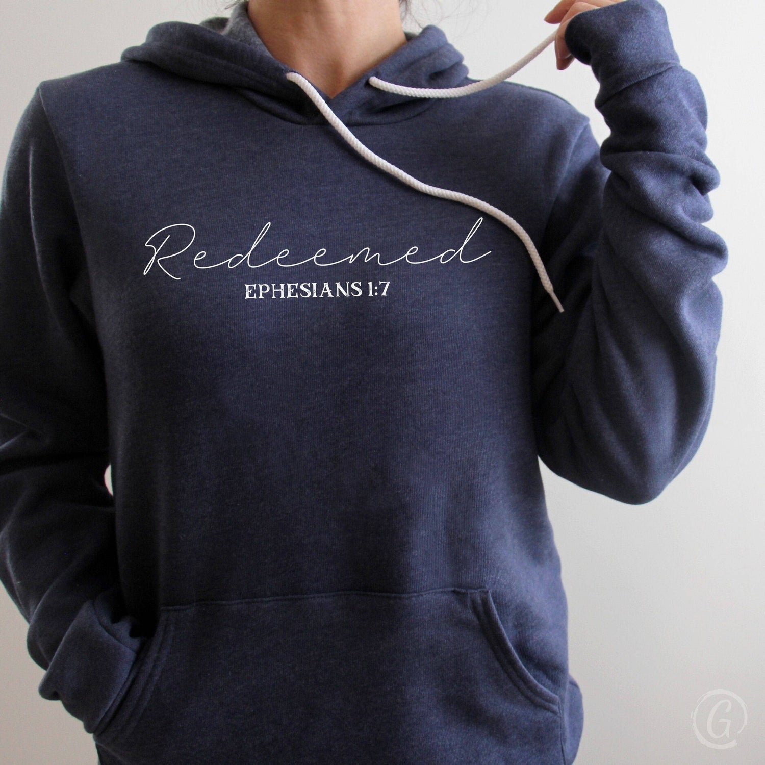 Redeemed Ephesians 1:7 Premium Unisex Pullover Hoodie Heather Navy