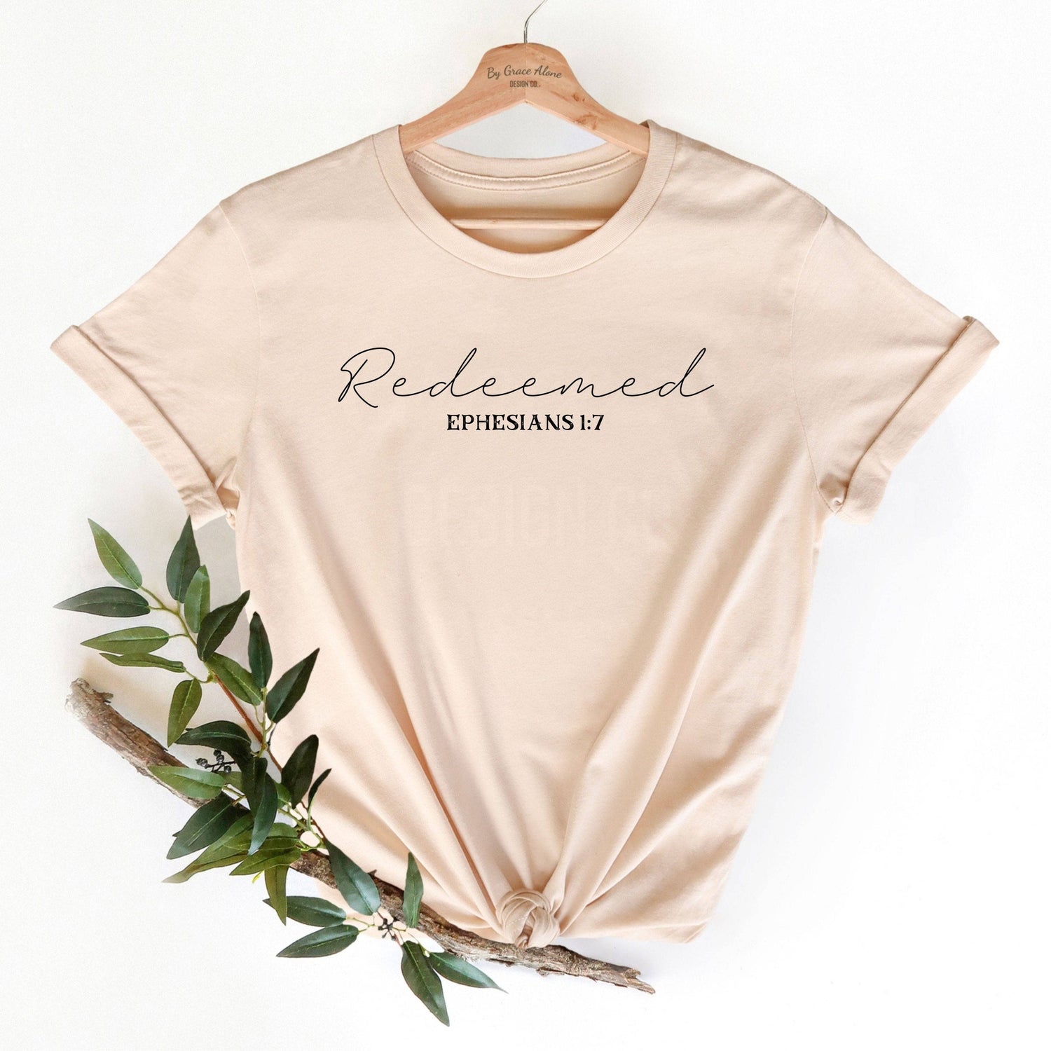 Redeemed Ephesians 1:7 Unisex T-Shirt Classics Soft Cream